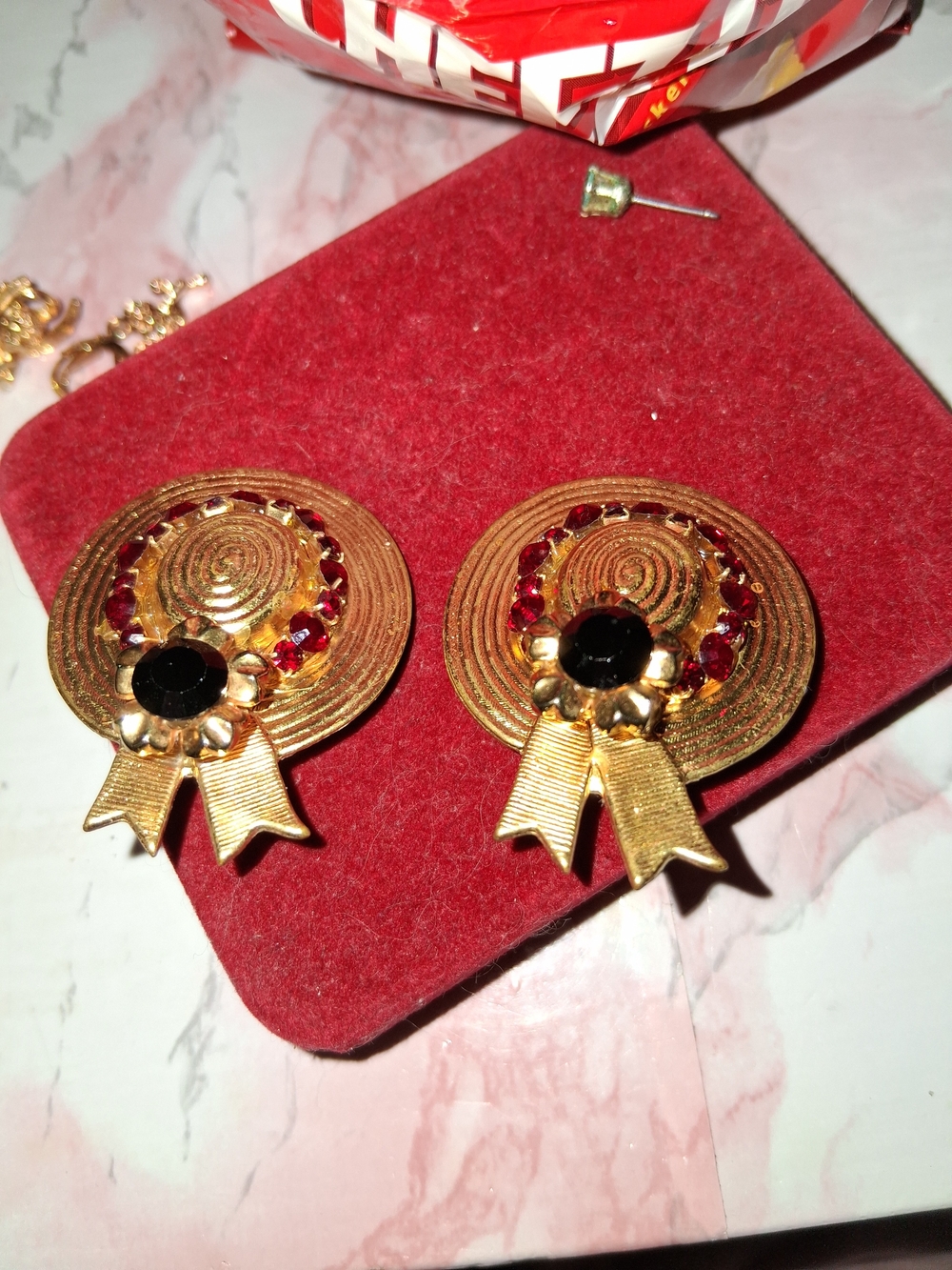 Gold-Tone Ribbon Medal Drop Earrings with Black Center and Red Accent Stones